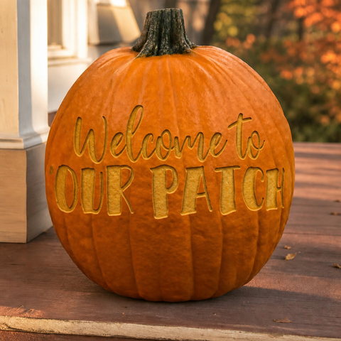 A pumpkin engraved with the welcome to our patch ready-made design
