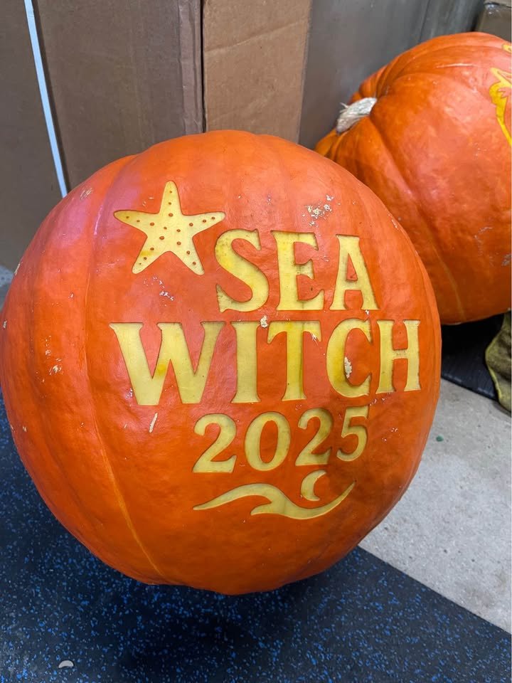 A pumpkin laser-engraved with Sea Witch 2025 and a starfish